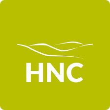 Huddersfield New College crest